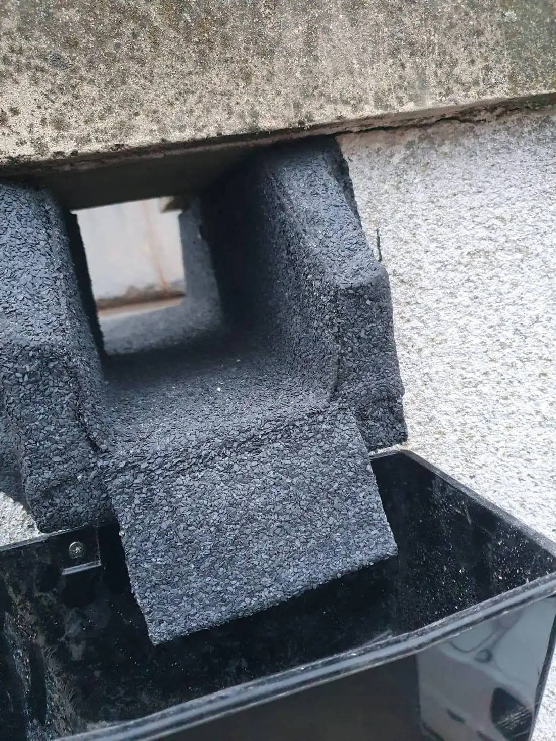 New lead apron dressed around a chimney
